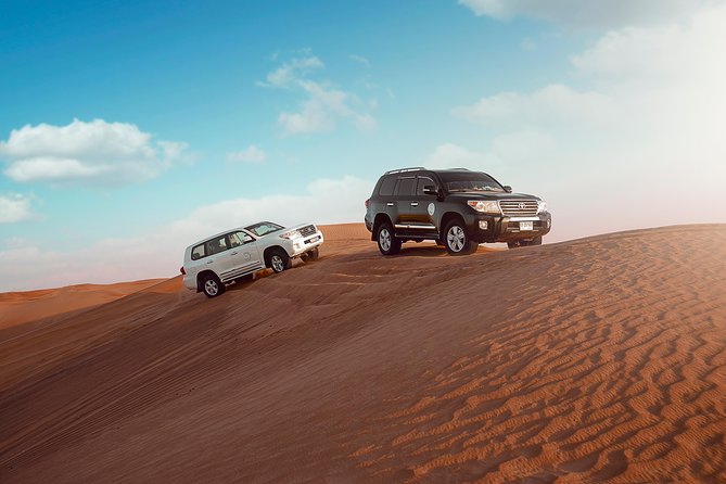 Desert Safari Dubai With Dune Bashing, Sandboarding, Camel Ride, 5 Shows, Dinner - Discover Dubais Golden Sands