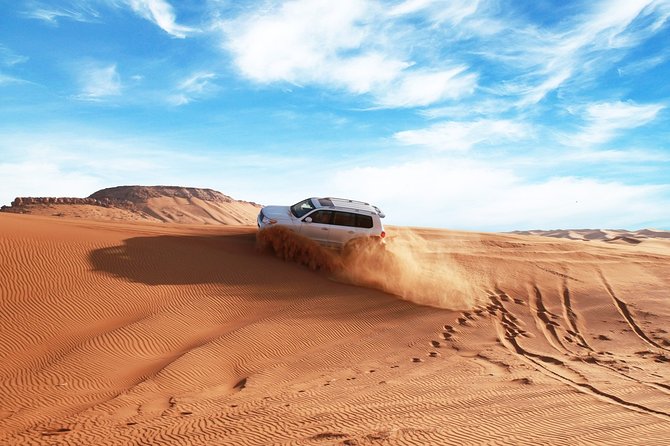 Dubai Red Dune Safari With Quad Bike, Sandboard & Camel Ride - Desert Safari Inclusions