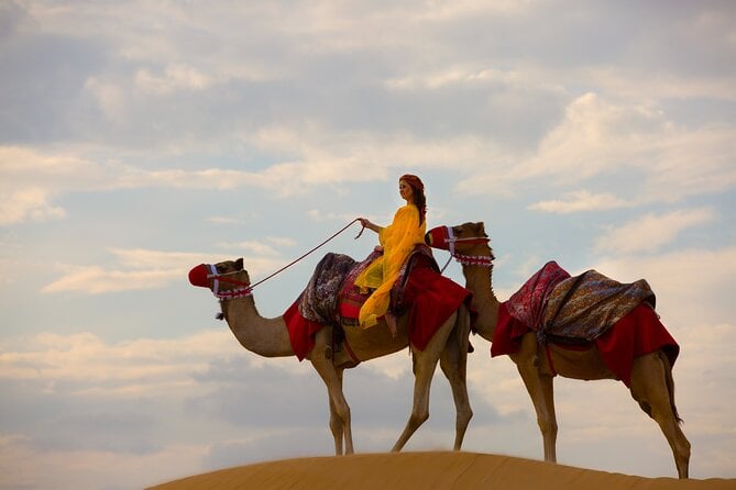 Dubai Self-drive Quad Bike, Sand Boarding, Camels & Refreshments - Thrilling Quad Biking Adventure