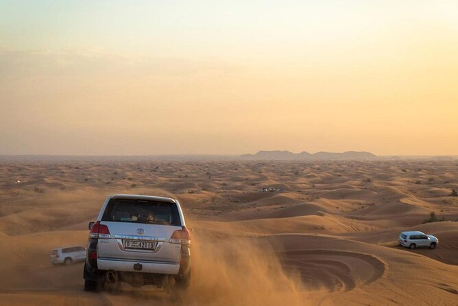 Morning Desert Safari Dubai:Red Dunes Desert,Camel Ride,Sand Boarding (Private) - Three Thrilling Desert Activities