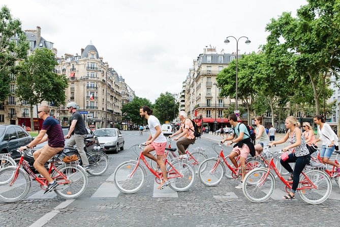 Paris Sightseeing Guided Bike Tour Like a Parisian With a Local Guide - Highlights of the Tour
