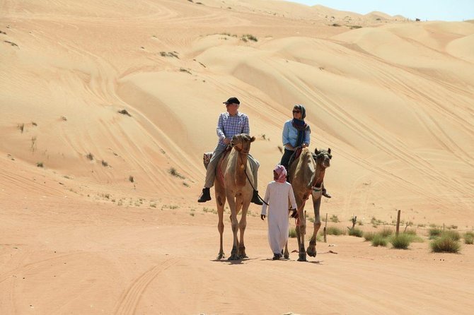 Red Dune Desert Safari With BBQ Dinner, Sand Boarding Dance Shows - Activity Overview