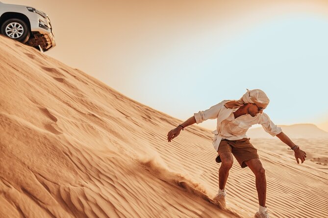Deluxe Sunset Desert Safari: Sandsurfing, Camel Ride & BBQ Dinner - Exclusions and Restrictions