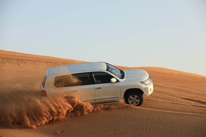 Dubai: Adventure Evening Desert Safari, Camel Ride, Shows & BBQ Dinner - Thrilling Sandboarding Adventure
