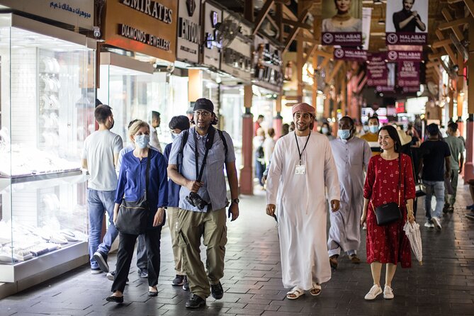 Dubai Aladdin Tour: Souks, Creek, Old Dubai and Tastings - Visiting Dubai Museum and Haggling in Souks