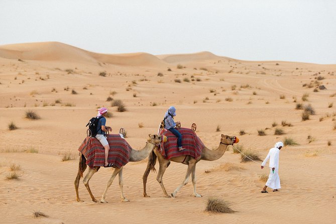 Dubai Camel Desert Safari, Traditional Meal & Heritage Activities - Bedouin-Style Camp Setting