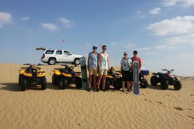 Dubai Desert Morning Tour in 4WD Vehicle: Camel Ride, Quad Bike Tour, Sandboarding, and Camel Farm - Quad Biking Adventure