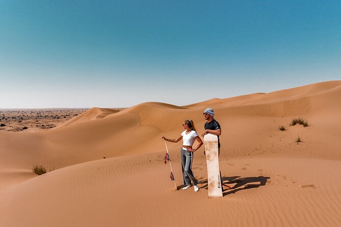 Dubai Desert Safari: Camel Ride, Sandboarding, BBQ & House Drinks - Dining and Entertainment