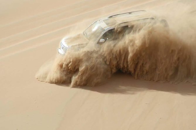 Dubai: Unique SUNSET 4WD Red Dunes Safari - Sandboarding Down the Dunes