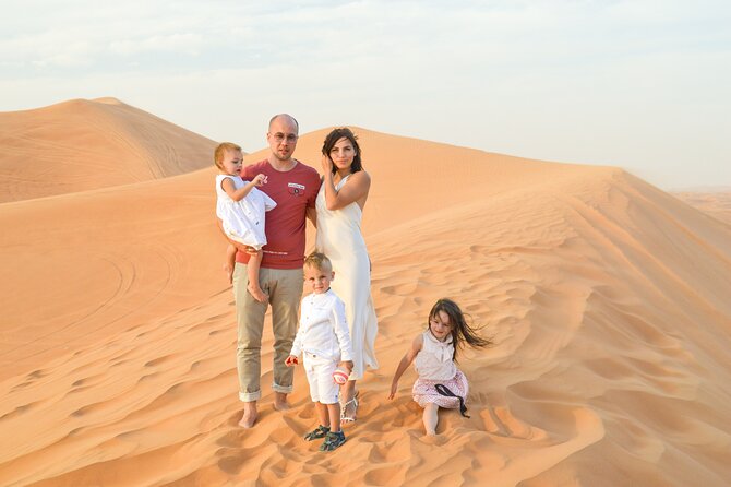 Full-Day Guided Red Dunes Desert Tour in Dubai With Camel Ride - Sandboarding Fun