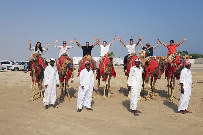 Half Day Desert Safari || Sand Boarding || Camel Ride || Inland Sea Visit || - Set out on a Camel Adventure