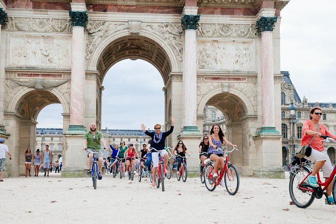 Paris Sightseeing Guided Bike Tour Like a Parisian With a Local Guide - Confirmation and Minimum Travelers