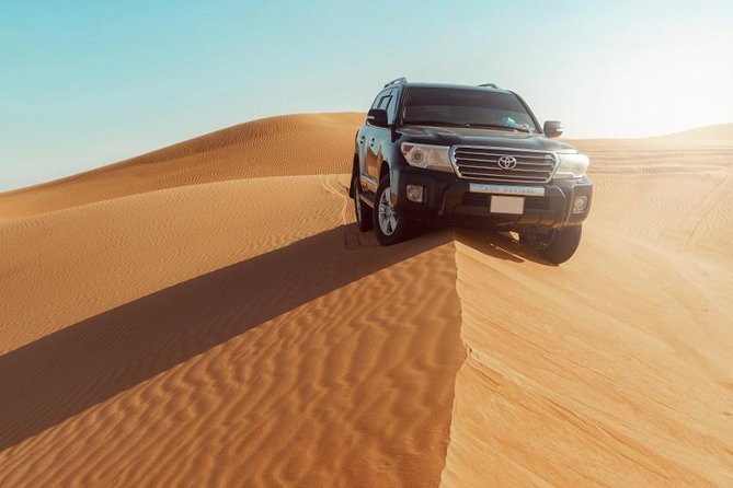 Desert Safari Dubai With Dune Bashing, Sandboarding, Camel Ride, 5 Shows, Dinner - Camel Ride Through the Desert