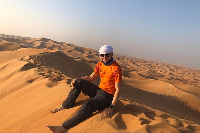 Dubai: Unique MORNING Quad Bike Red Dunes Safari - Sandboarding in the Dunes