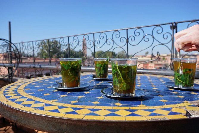 Experience Marrakech: Visit Market and Cook Traditional Tajine - Savoring the Homemade Lunch at Riad