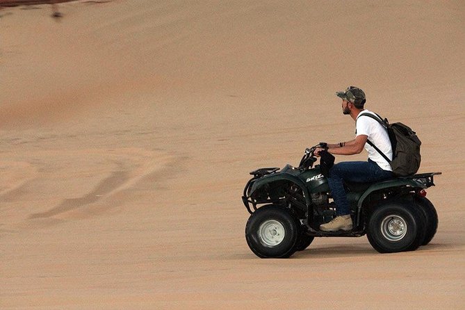 Red Sand Morning Desert Safari With Quad Bike, Sand Boarding & Camel Ride - Sandboarding Down the Dunes
