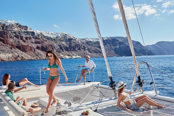 Santorini Sunset Luxury Sailing Catamaran Cruise With Bbq, Drinks, Transfer - Traditional Greek Barbecue and Drinks