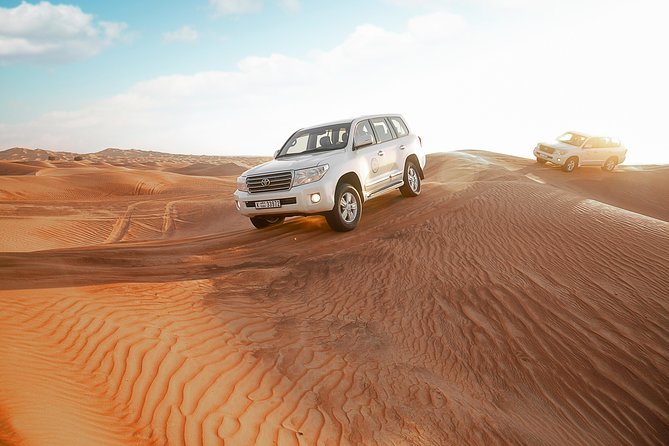 Desert Safari Dubai With Dune Bashing, Sandboarding, Camel Ride, 5 Shows, Dinner - Immersive Cultural Experiences
