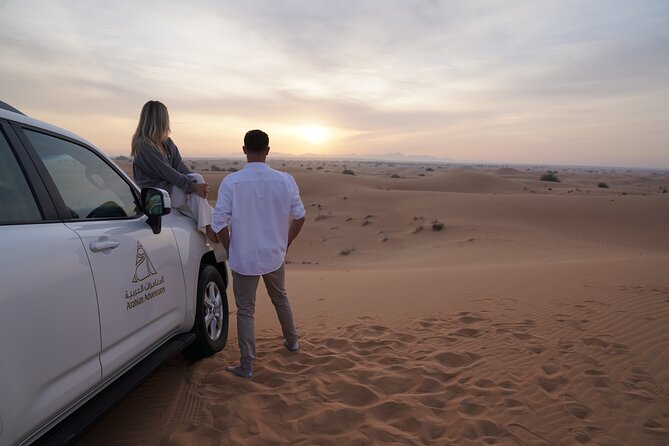 Dubai Desert Safari: Camel Ride, Sandboarding, BBQ & House Drinks - Location and Duration