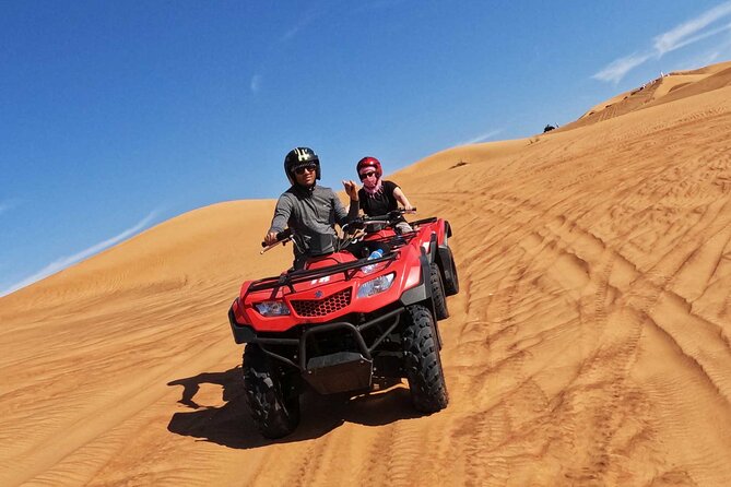Dubai: Quad Bike Safari, Camels, & Camp With BBQ Dinner - Barbecue Dinner and Entertainment