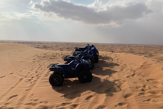 Dubai: Unique SUNSET Quad Bike Red Dunes Safari - Cancellation Policy