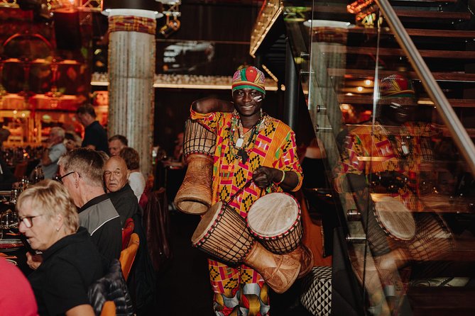 From CapeTown: African Dinner and Drumming Experience - Rhythmic Drumming and Entertainment