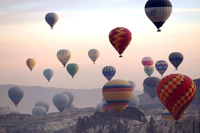 Cappadocia Hot Air Balloon Tour Over Fairychimneys - Morning-Lit Landscape Panorama