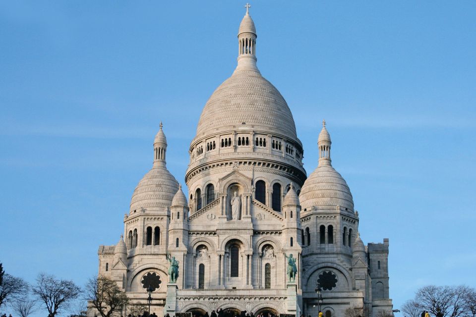 Paris: Montmartre Small Group Guided Walking Tour - Charming Squares and Residences