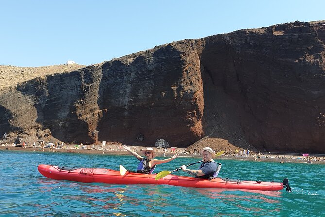 Santorini Sea Kayak - South Discovery, Small Group Incl. Sea Caves and Picnic - Enjoying a Local Picnic Lunch