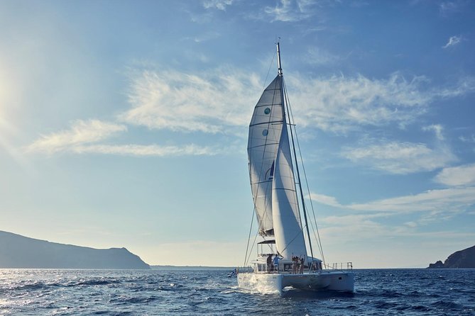 Santorini Sunset Luxury Sailing Catamaran Cruise With Bbq, Drinks, Transfer - Exploring the Volcanic Caldera