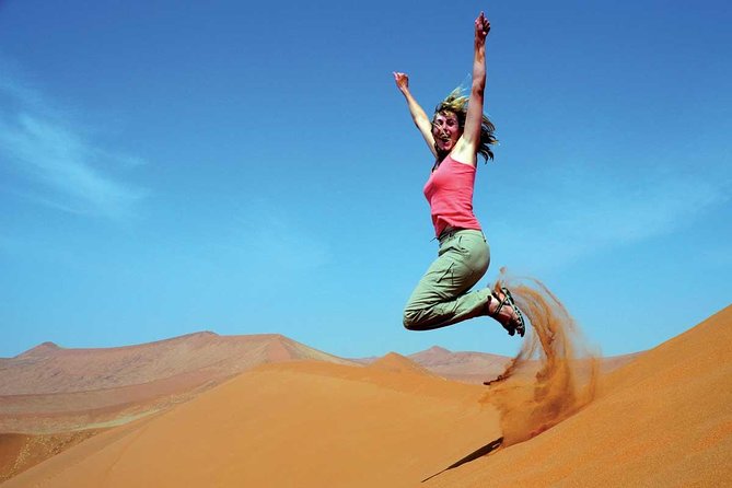 Dubai Desert Safari With BBQ Dinner, Sandboarding, Camels & Shows - Restrictions and Considerations