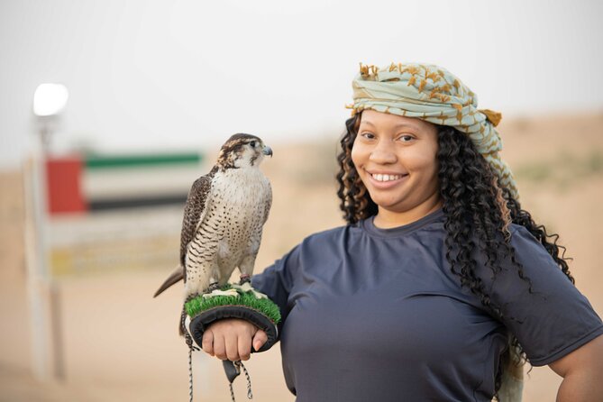 Dubai Half-Day Red Dunes Bashing With Sandboarding, Camel &Falcon - Highlights of the Tour