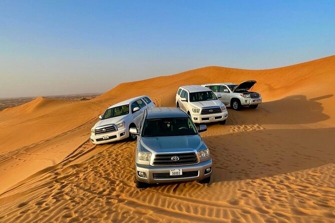 Guided Desert Safari With Dinner and Quad Biking in Dubai - Tanura Fire Show and Belly Dancer