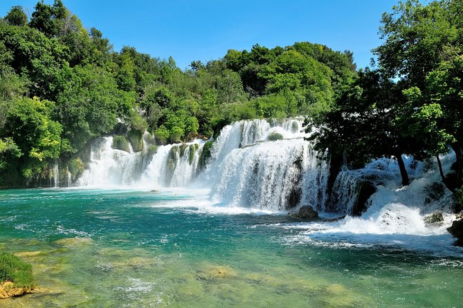 Krka Waterfalls Tour With Trogir Walking Tour and Krka Panoramic Boat Cruise - Historic Villages and Watermills