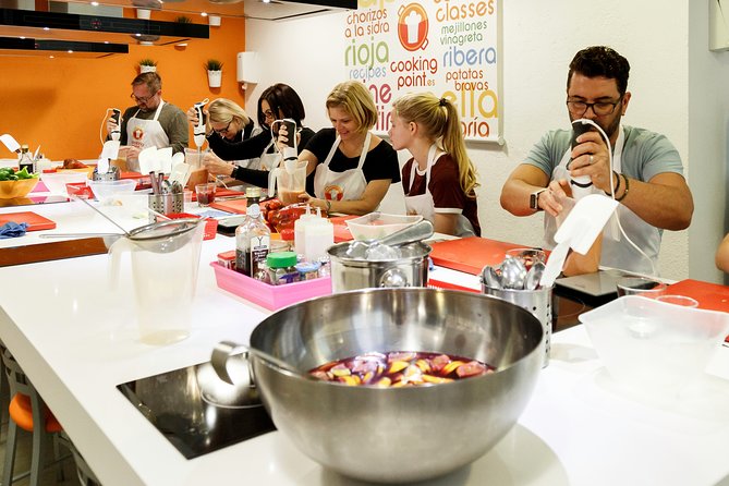 Spanish Cooking Class: Paella, Tapas & Sangria in Madrid - Expert Chef Instruction
