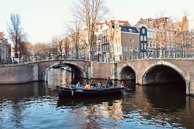 Amsterdam Canal Cruise on a Small Open Boat (Max 12 Guests) - Weather-Related Cancellations