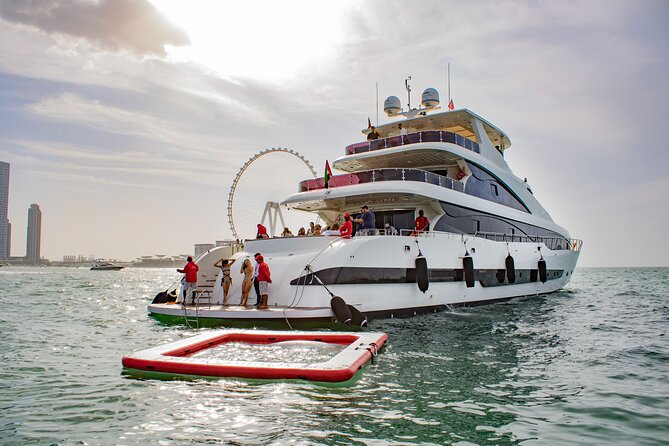 Dubai Harbour Super Yacht Experience With Live Station & Drinks - Whats Included in the Experience