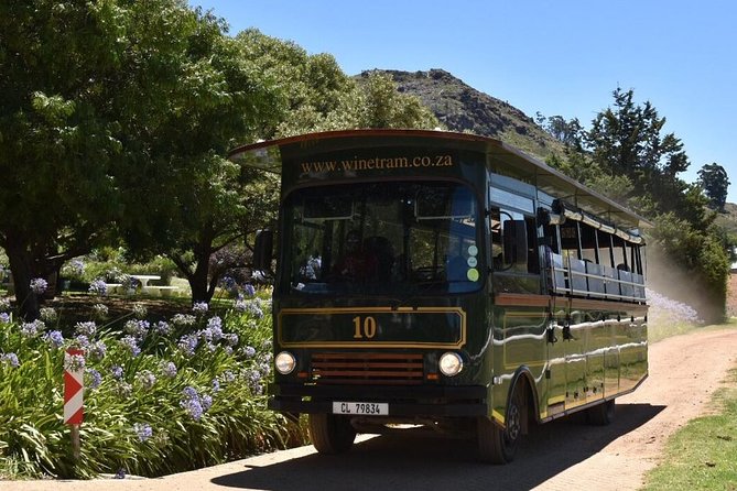 Full-Day Franschhoek Hop on Hop off Wine Tram Tour From Cape Town - Exploring Franschhoek Wineries