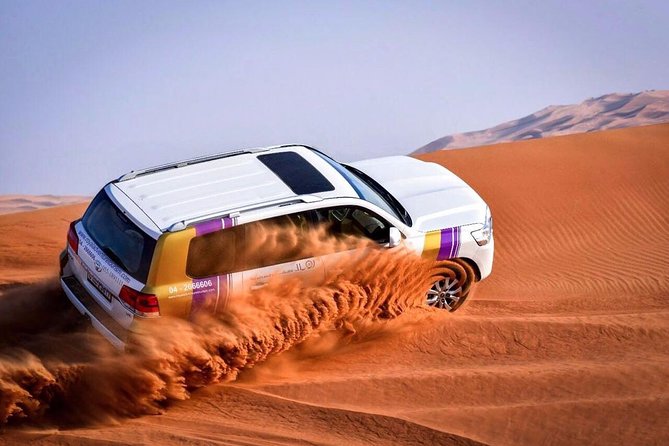 Dubai Desert Safari With BBQ and 4W Land Cruiser Dune Bashing Experience - Key Points