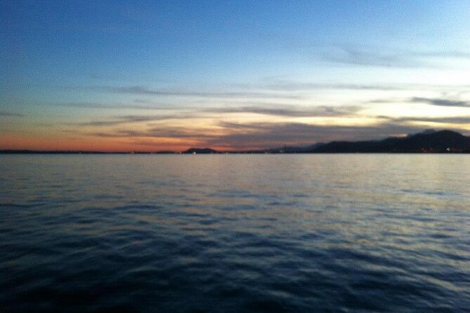 Alcudia Sunset Boat Trip Drinks, SUP & Snorkel - Trip Overview