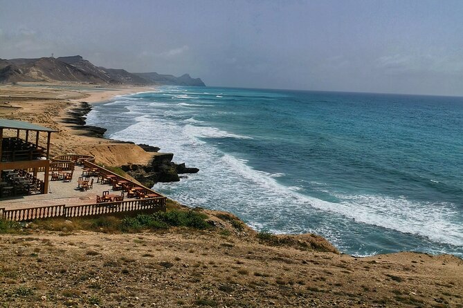 discover-dhofar-east-and-west-white-beach-waterfall-camels-mountains-tour-overview