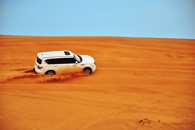 Doha: Desert Safari With Quad Bike ,Camel Ride and Sand Boarding