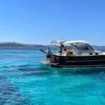 from-palau-south-corsica-trip-by-wood-speedboat-with-lunch-navigating-from-sardinia-to-corsica