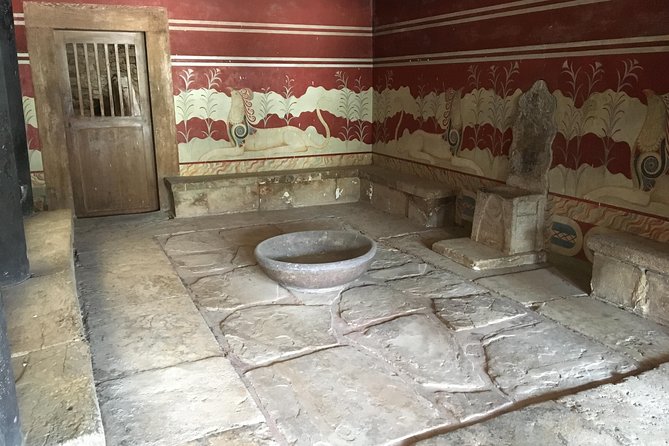 Knossos Palace Guided Walking Tour - Exploring Knossos Palaces Excavation and Restoration