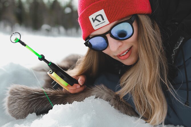 Lappish Lunch Break - Snowmobiling, Ice Fishing and Tasty Food