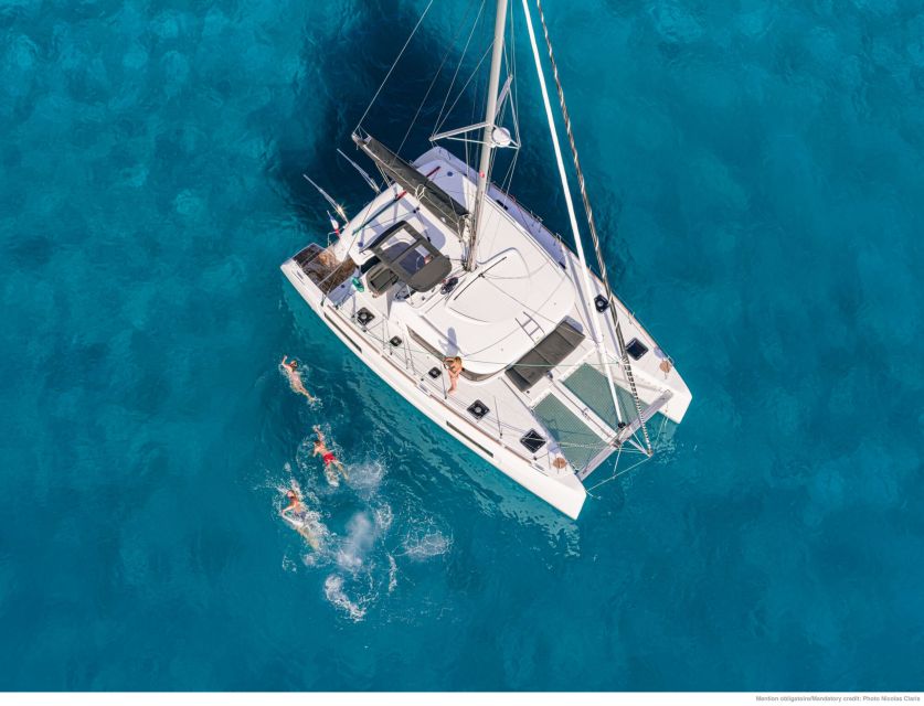 Mykonos: Private Catamaran Cruise W/ Food, Drinks & Transfer