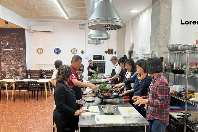 Seafood Paella Cooking Class, Tapas and Visit to Ruzafa Market. - Overview of the Class
