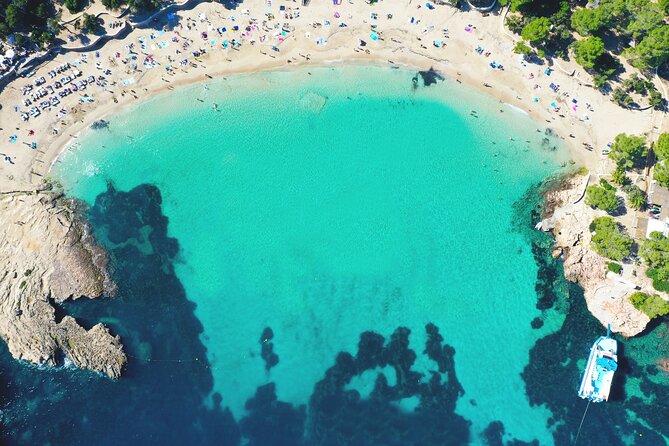 Sunset Beach Hopping Cruise, Cala Comte and Cala Bassa, SUP and Snorkelling