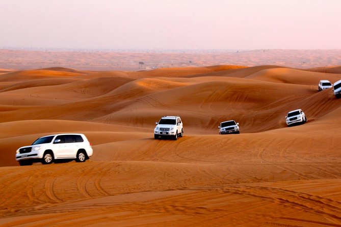 Dubai Desert Safari With BBQ Dinner Pickup From Ras Al Khaimah - Camel Riding and Cultural Activities