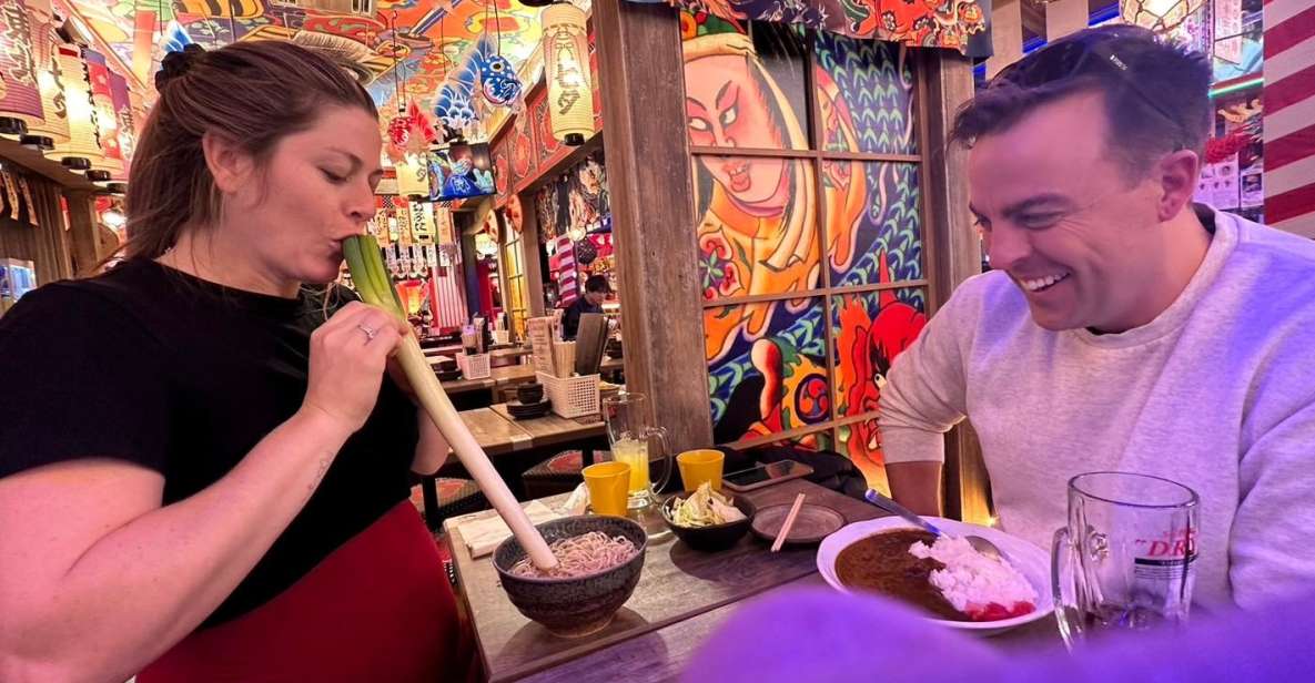 Shinjuku Golden Gai Walking Food Tour With A Master Guide - Exploring Omoide Yokocho and Kabukicho